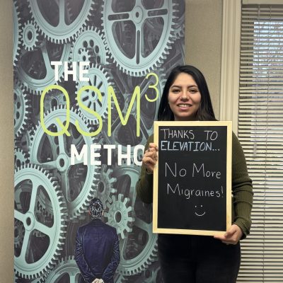 Patient holding sign: no more migraines
